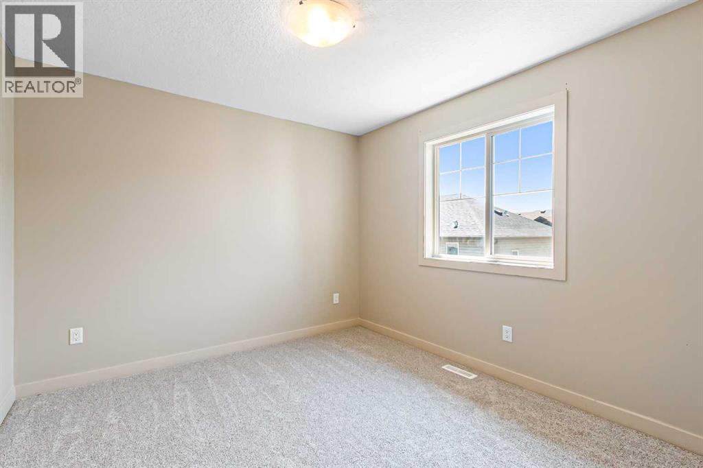 973 Channelside Road Sw, Airdrie, Alberta  T4B 3J4 - Photo 19 - A2245356