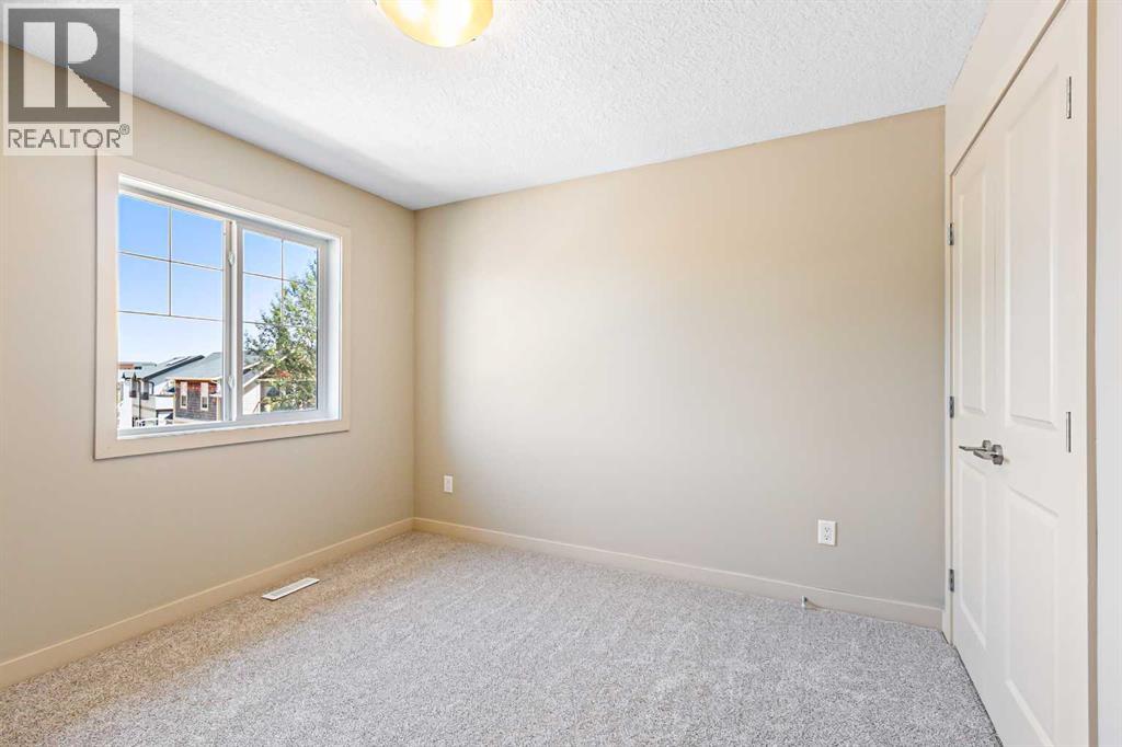 973 Channelside Road Sw, Airdrie, Alberta  T4B 3J4 - Photo 18 - A2245356