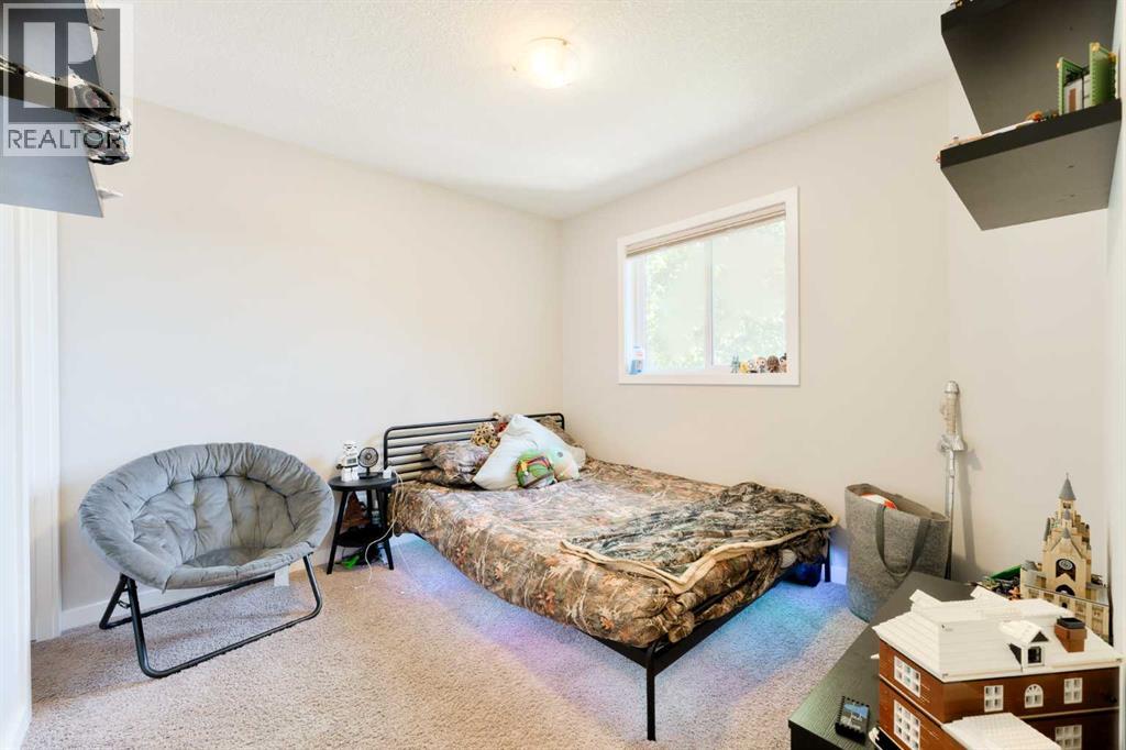 40 Sunrise Terrace, Cochrane, Alberta  T4C 0V3 - Photo 16 - A2248798