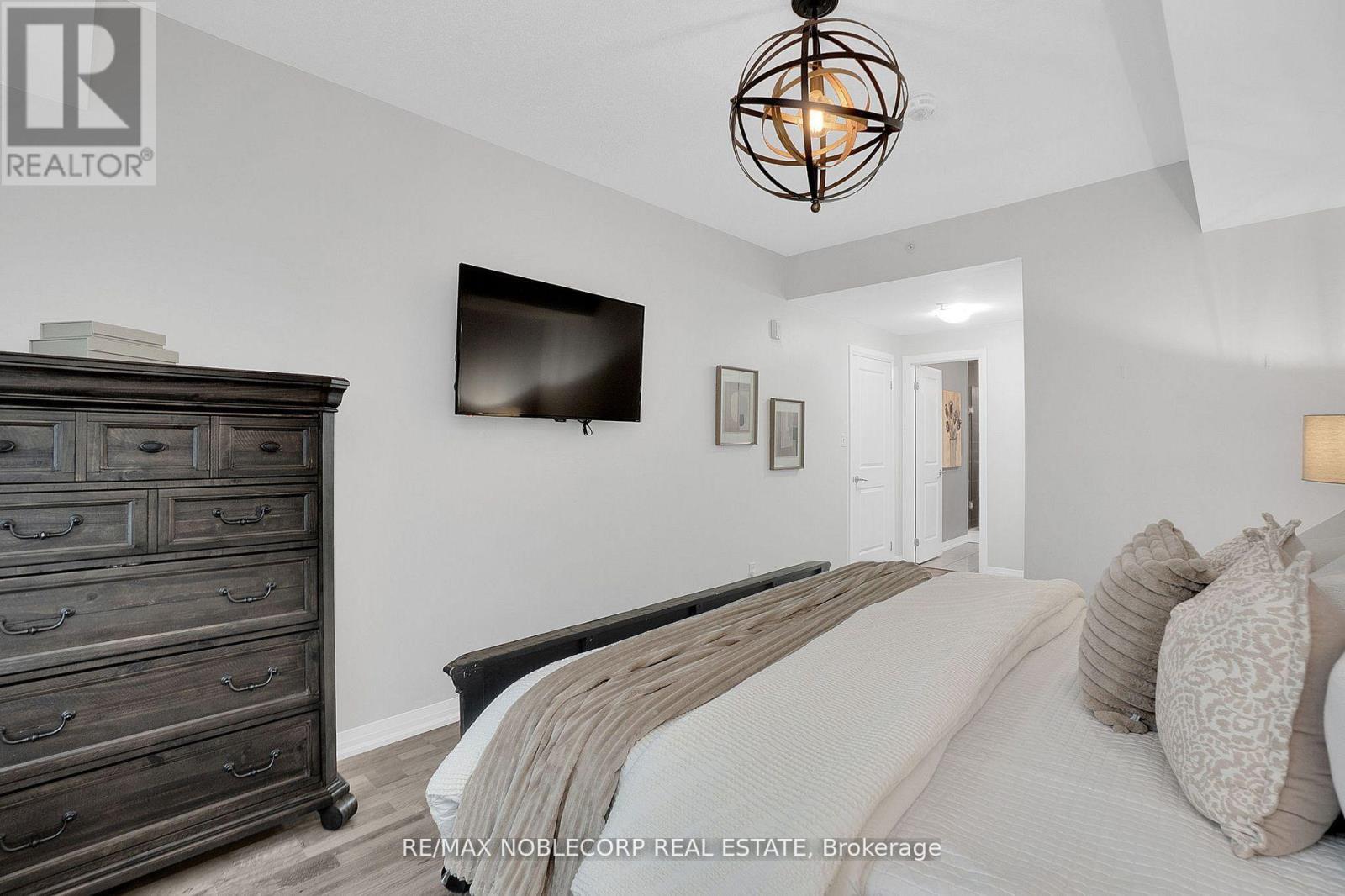 206 - 157 Wellington Street E, New Tecumseth (Alliston), Ontario  L9R 0R7 - Photo 18 - N12495056