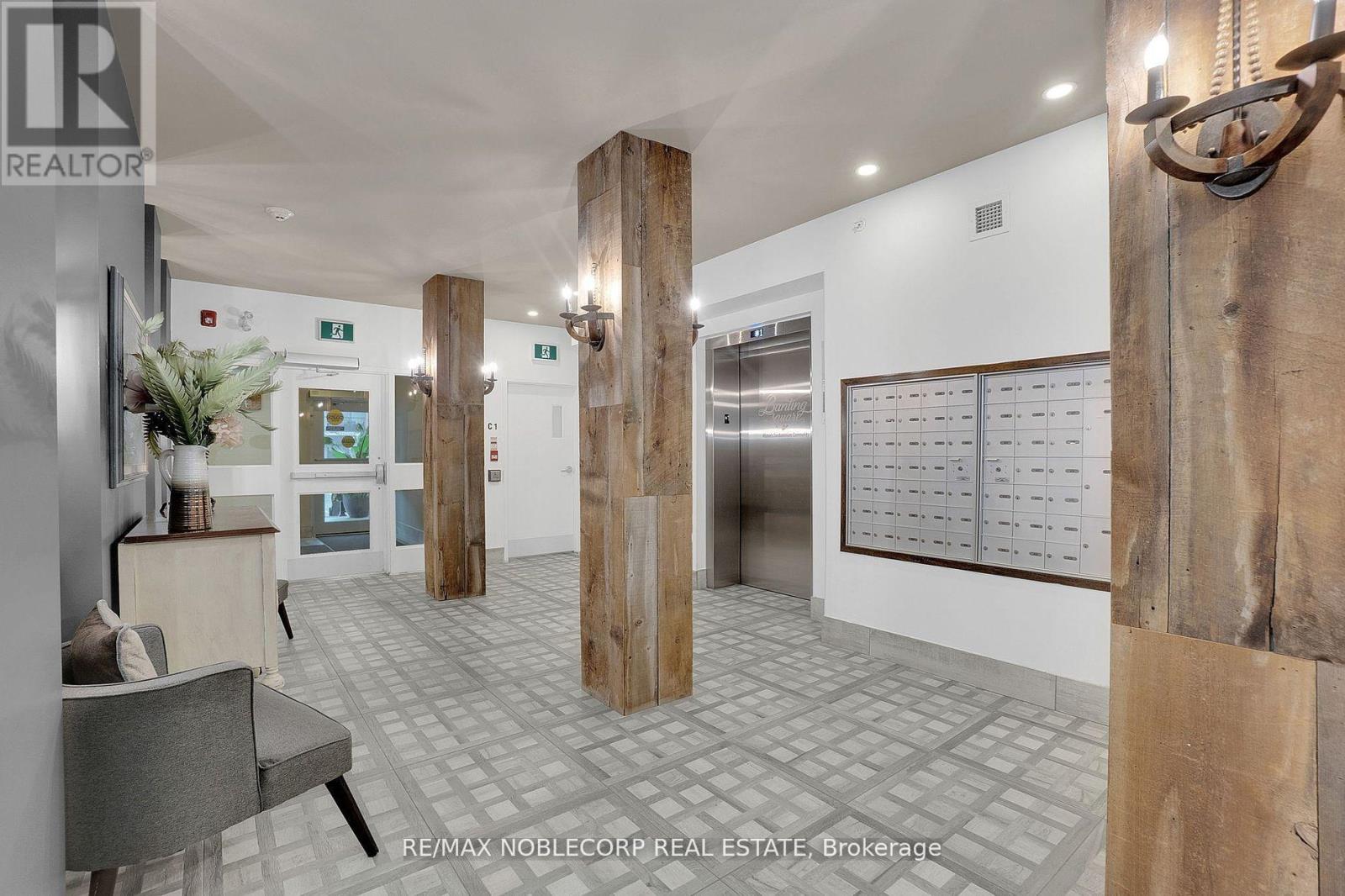 206 - 157 Wellington Street E, New Tecumseth (Alliston), Ontario  L9R 0R7 - Photo 2 - N12495056