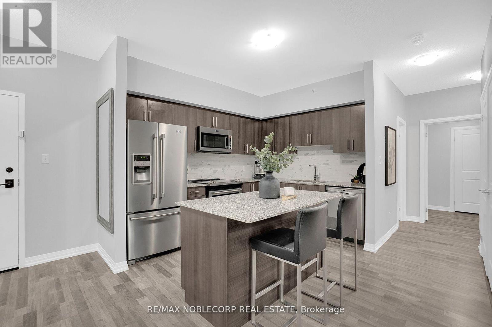 206 - 157 Wellington Street E, New Tecumseth (Alliston), Ontario  L9R 0R7 - Photo 5 - N12495056