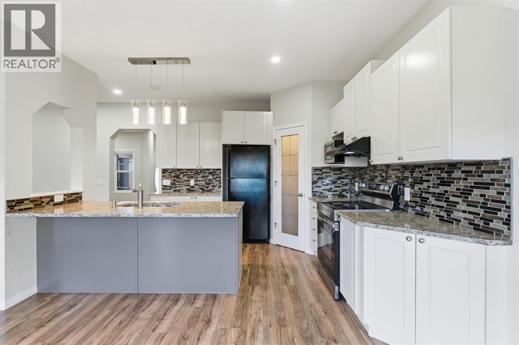 64 Cougarstone Square Sw, Calgary, Alberta  T3H 5J4 - Photo 7 - A2262348