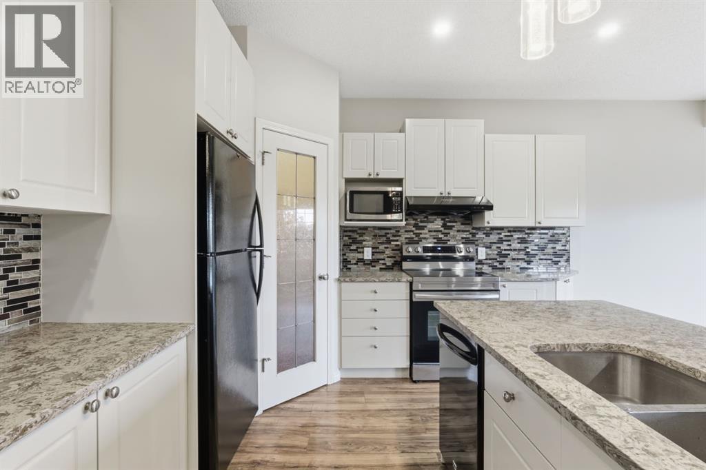 64 Cougarstone Square Sw, Calgary, Alberta  T3H 5J4 - Photo 9 - A2262348