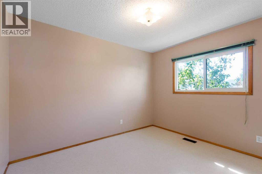 125 Big Springs Drive, Airdrie, Alberta  T4A 1K9 - Photo 12 - A2247354