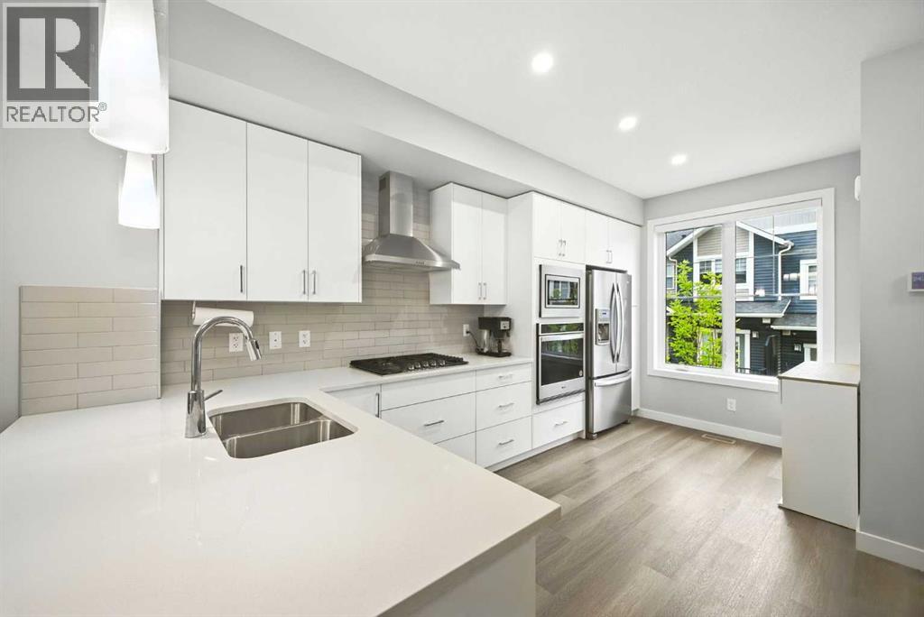 908 Sage Hill Grove Nw, Calgary, Alberta  T3R 2A2 - Photo 4 - A2253660