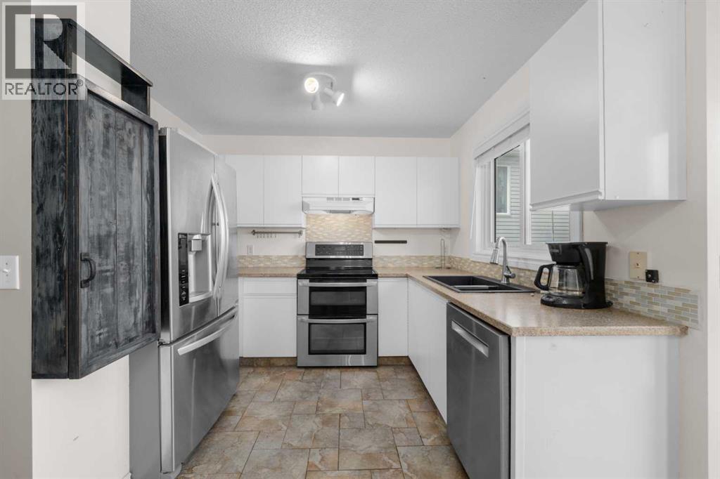 10884 Hidden Valley Drive Nw, Calgary, Alberta  T3A 5H2 - Photo 8 - A2256670