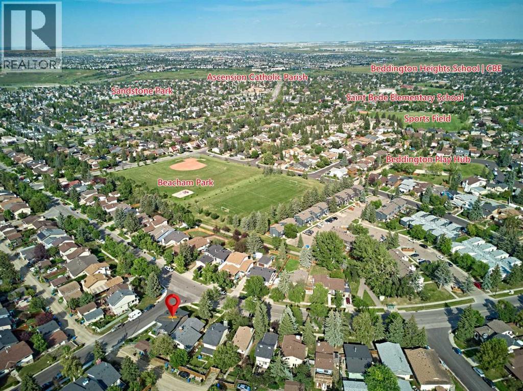 1371 Berkley Drive Nw, Calgary, Alberta  T3K 1T4 - Photo 4 - A2265900