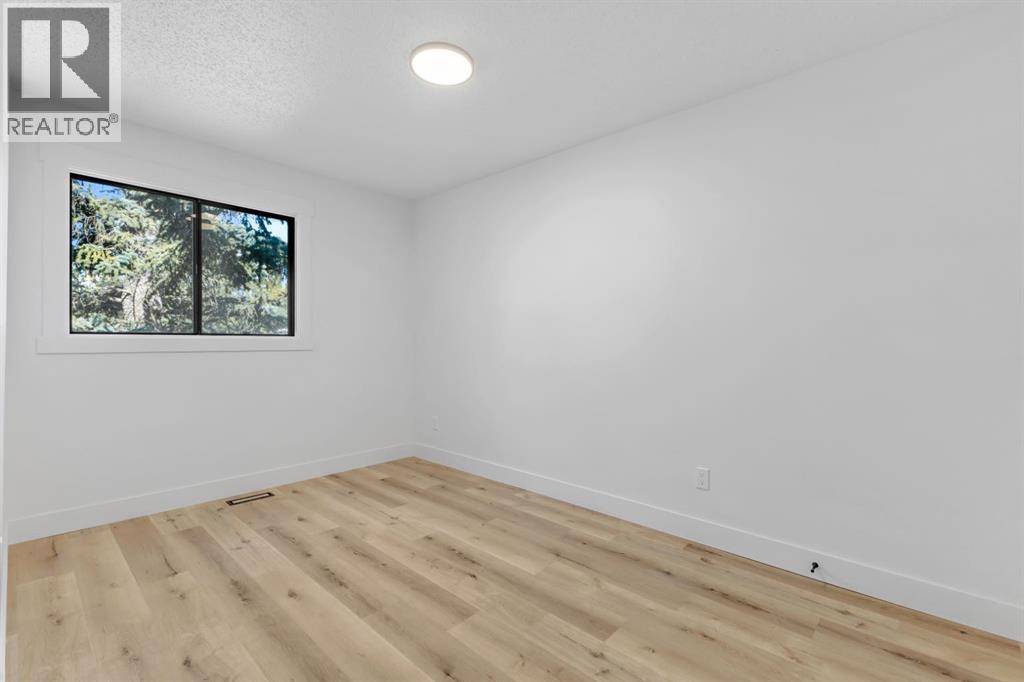 208 Cedarille Green Sw, Calgary, Alberta  T2W 2H4 - Photo 10 - A2260448