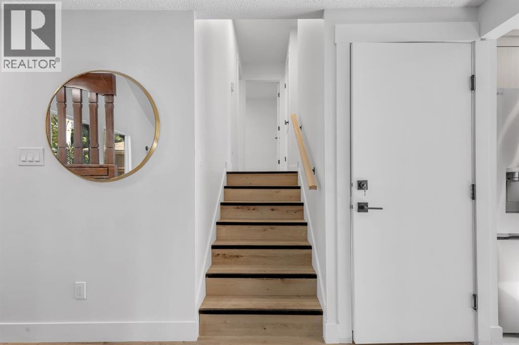 208 Cedarille Green Sw, Calgary, Alberta  T2W 2H4 - Photo 9 - A2260448