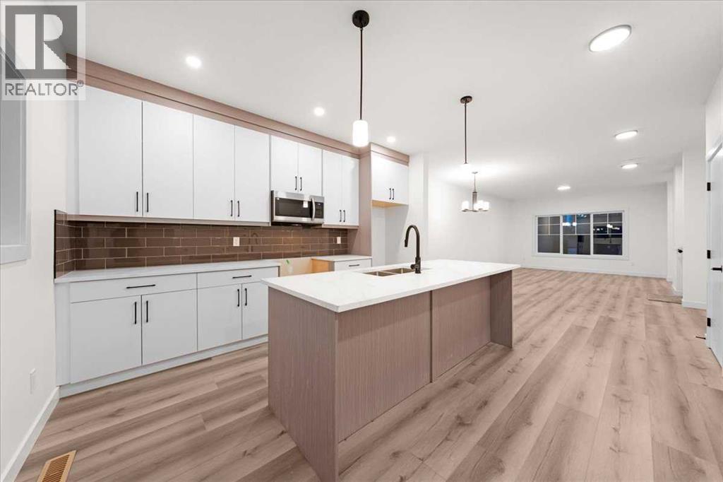 39 Baysprings Terrace Sw, Airdrie, Alberta  T4B 4A7 - Photo 13 - A2266130