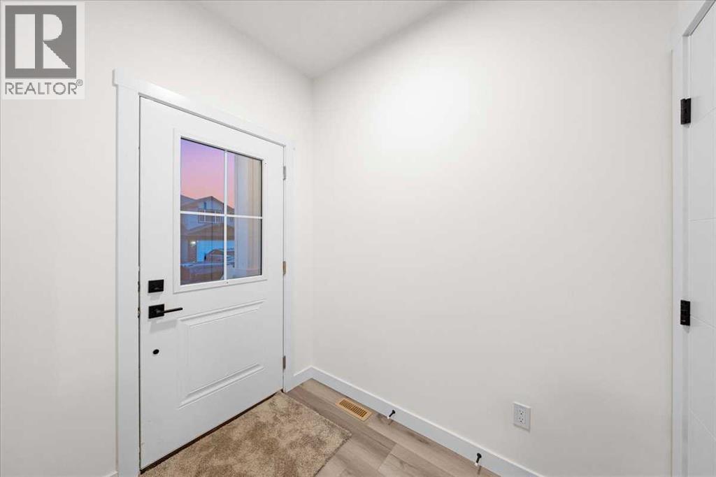 39 Baysprings Terrace Sw, Airdrie, Alberta  T4B 4A7 - Photo 5 - A2266130