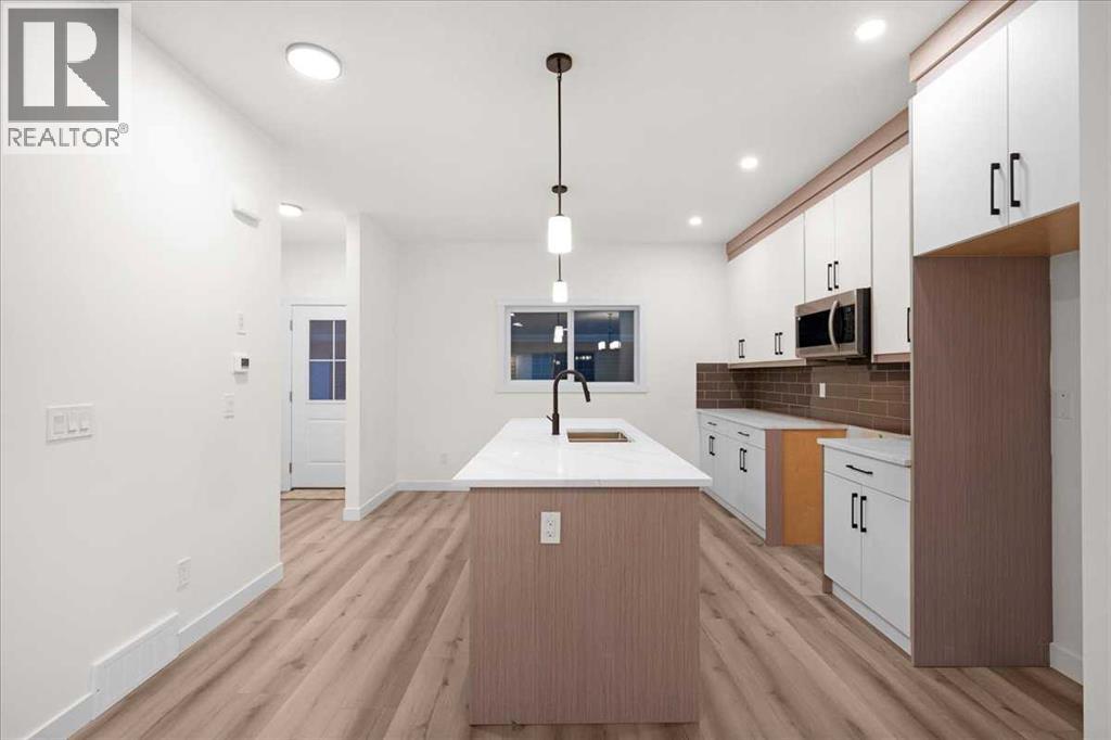 39 Baysprings Terrace Sw, Airdrie, Alberta  T4B 4A7 - Photo 11 - A2266130