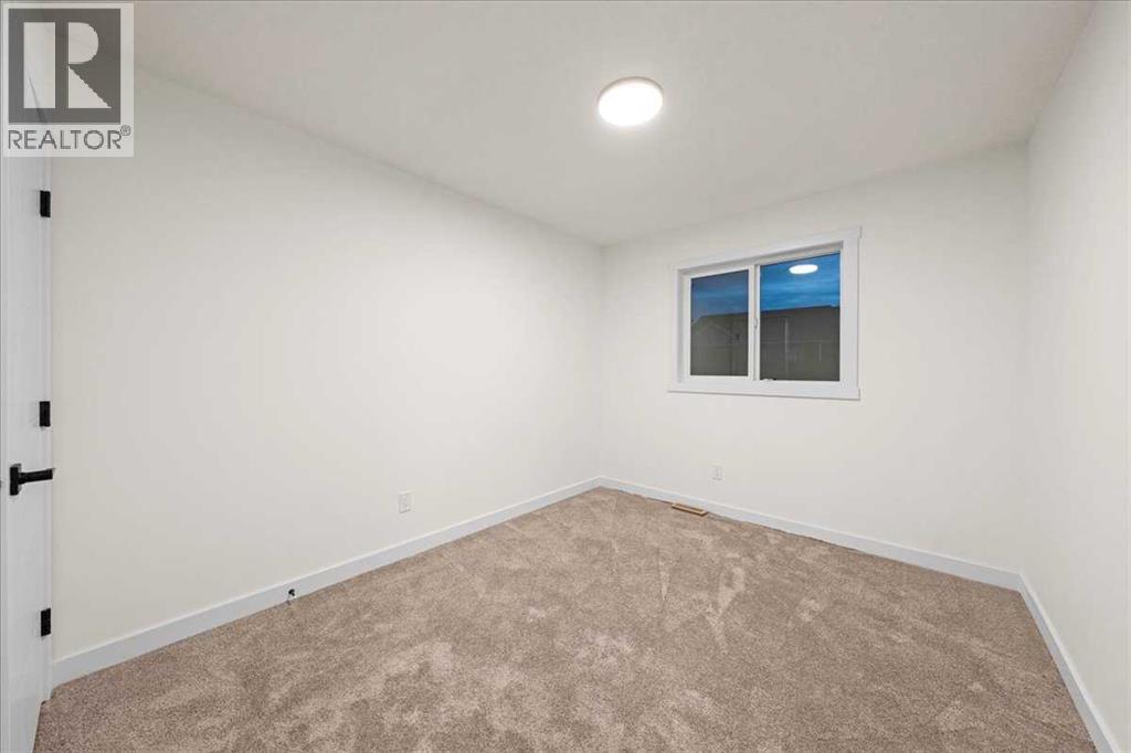 39 Baysprings Terrace Sw, Airdrie, Alberta  T4B 4A7 - Photo 24 - A2266130