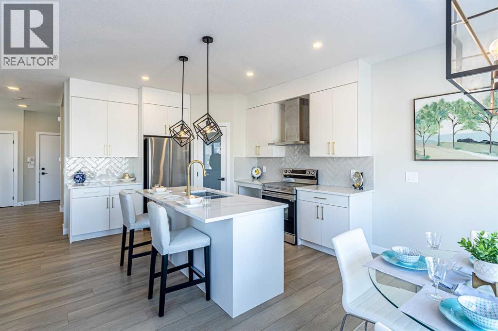 8 Waterford Manor, Chestermere, Alberta  T1X 2T9 - Photo 4 - A2233055