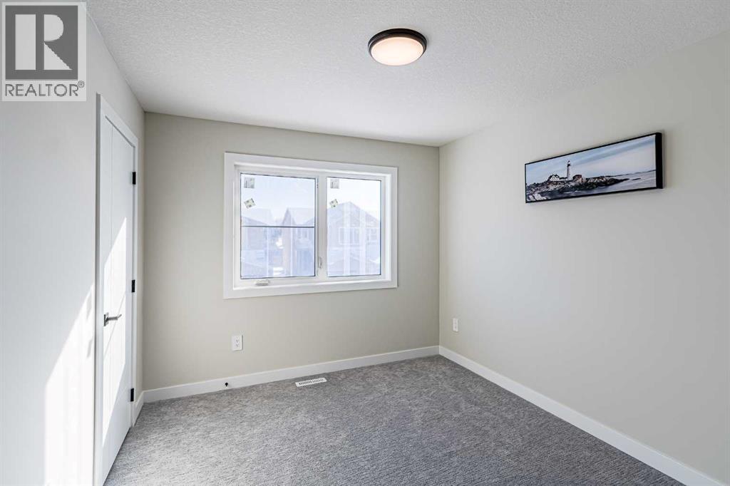 8 Waterford Manor, Chestermere, Alberta  T1X 2T9 - Photo 12 - A2233055