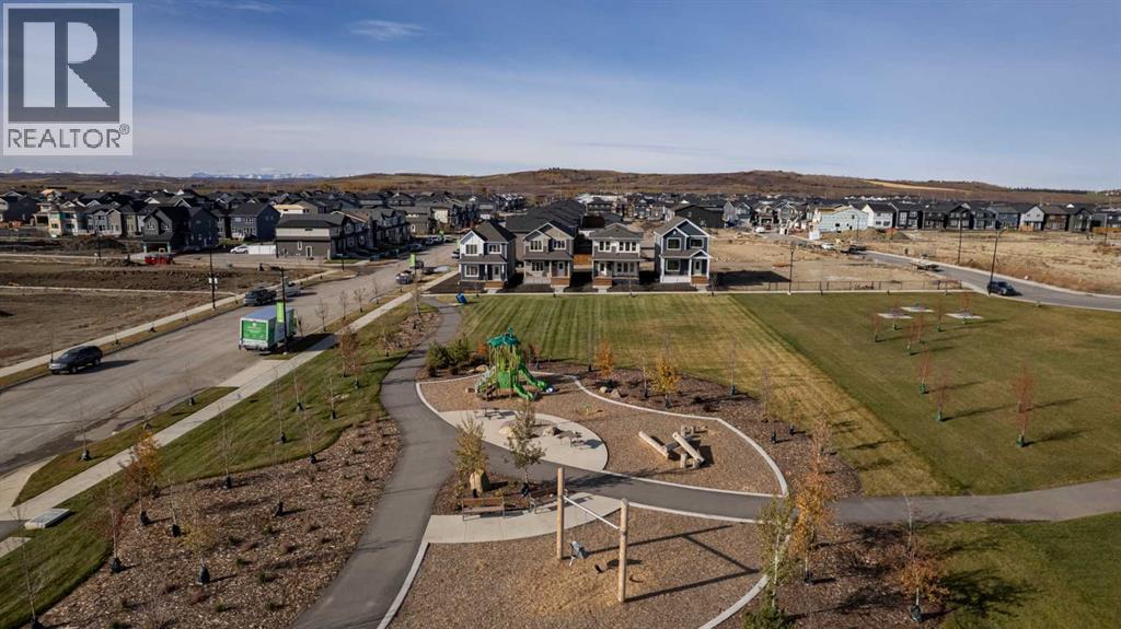 15 Creekstone Walk Sw, Calgary, Alberta  T2X 4Y1 - Photo 3 - A2259697