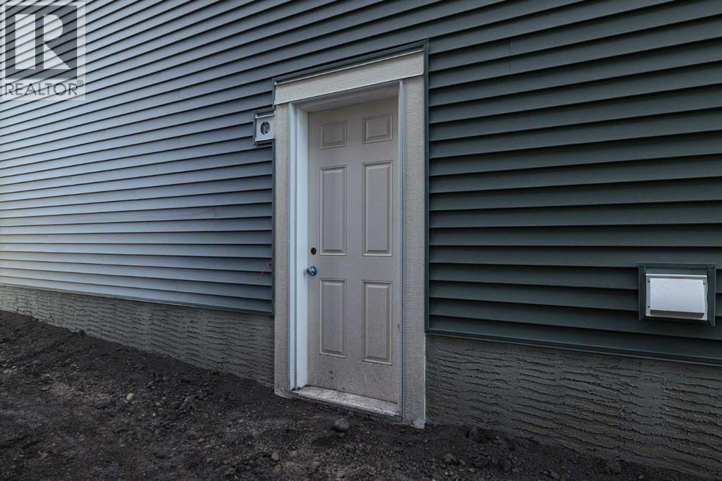 15 Creekstone Walk Sw, Calgary, Alberta  T2X 4Y1 - Photo 4 - A2259697