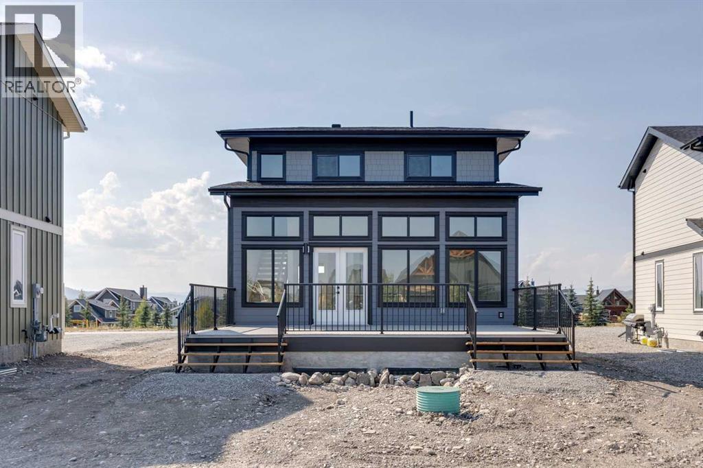 640 Cottageclub Bend, Rural Rocky View County, Alberta  T4C 1B1 - Photo 2 - A2258195