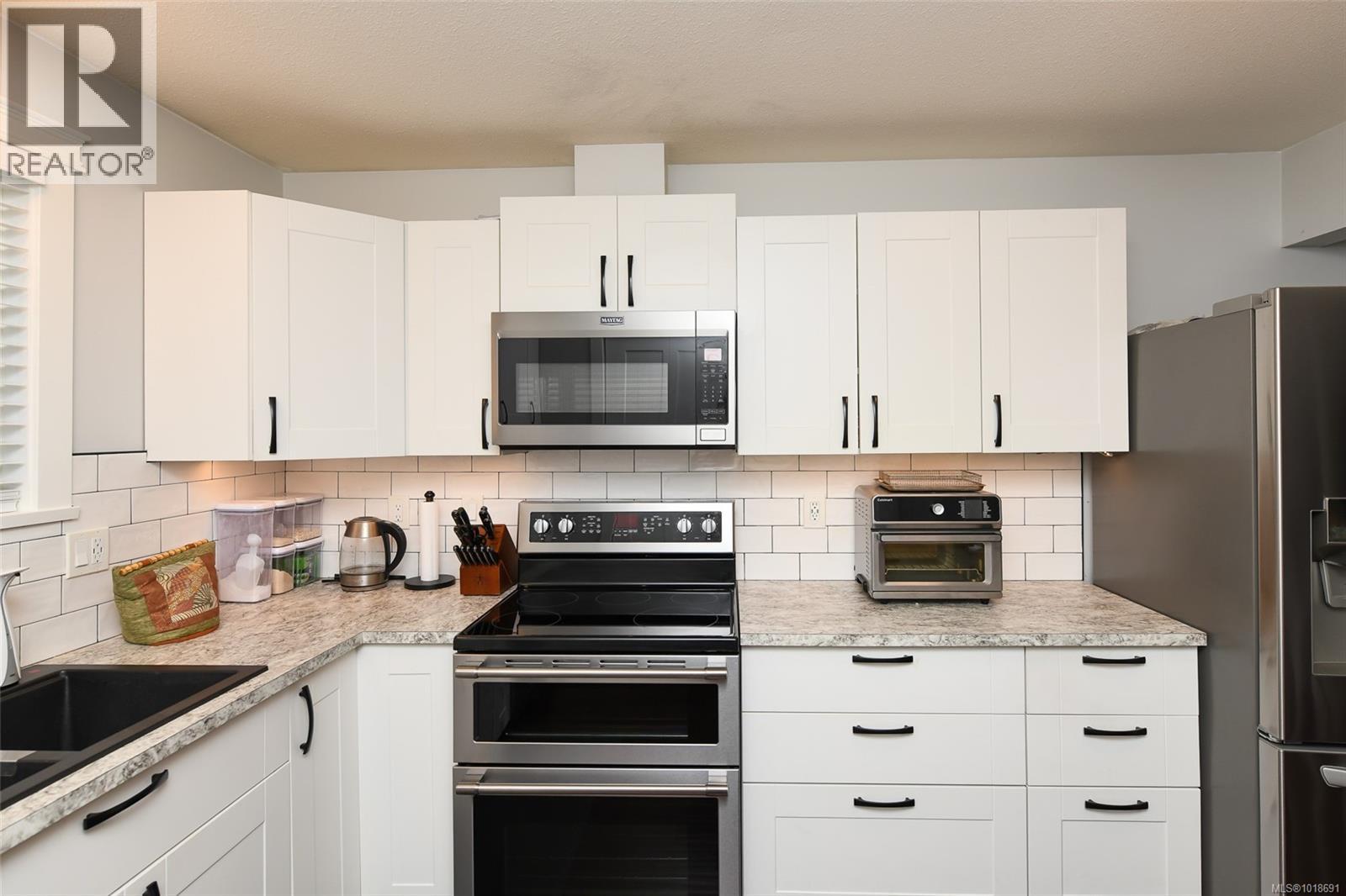 32 1535 Dingwall Rd, Courtenay, British Columbia  V9N 3S8 - Photo 2 - 1018691