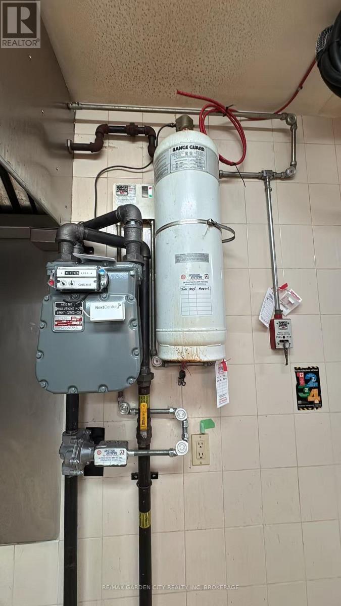 Commercial Unit - 7737 Lundy's Lane, Niagara Falls, Ontario  L2H 1H3 - Photo 10 - X12496902