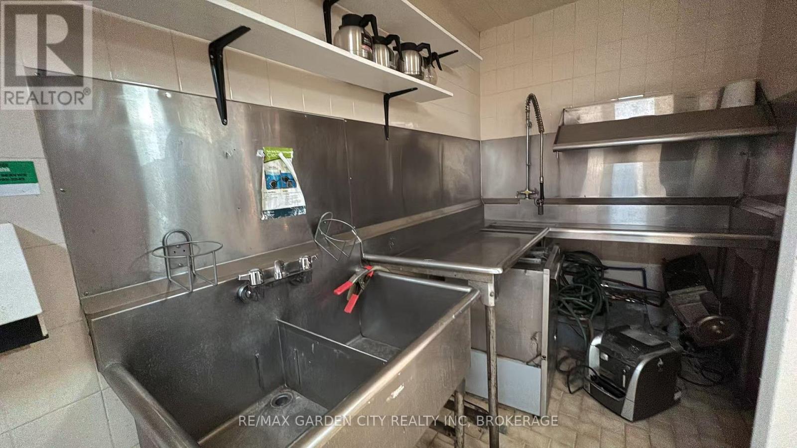 Commercial Unit - 7737 Lundy's Lane, Niagara Falls, Ontario  L2H 1H3 - Photo 6 - X12496902