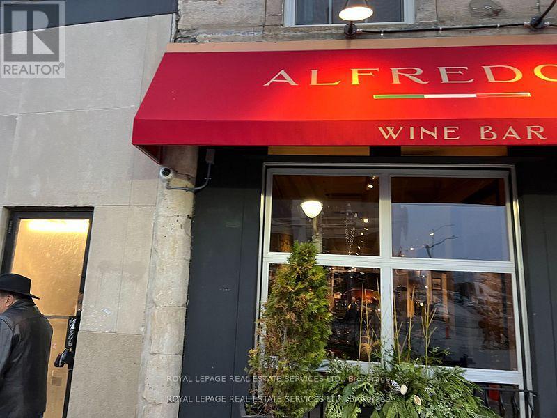 303 - 51 Wyndham Street N, Guelph, Ontario  N1H 4E4 - Photo 2 - X12496630