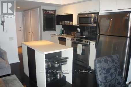 1707 - 21 Carlton Street, Toronto, Ontario  M5B 1L3 - Photo 2 - C12496960