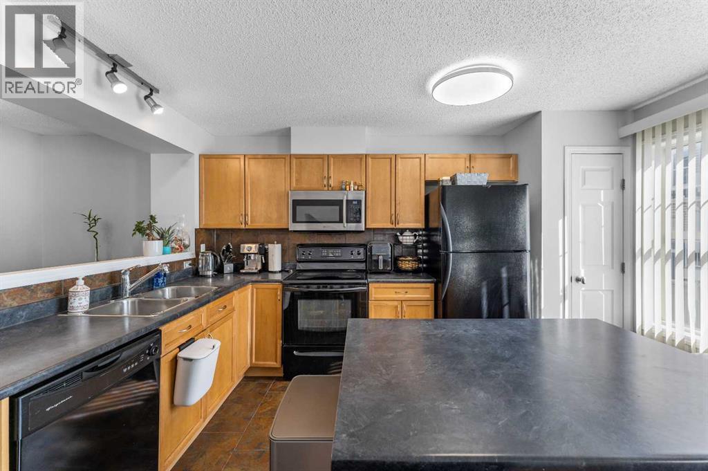 3305 New Brighton Gardens Se, Calgary, Alberta T2Z 0A2 - Photo 14 - A2262183