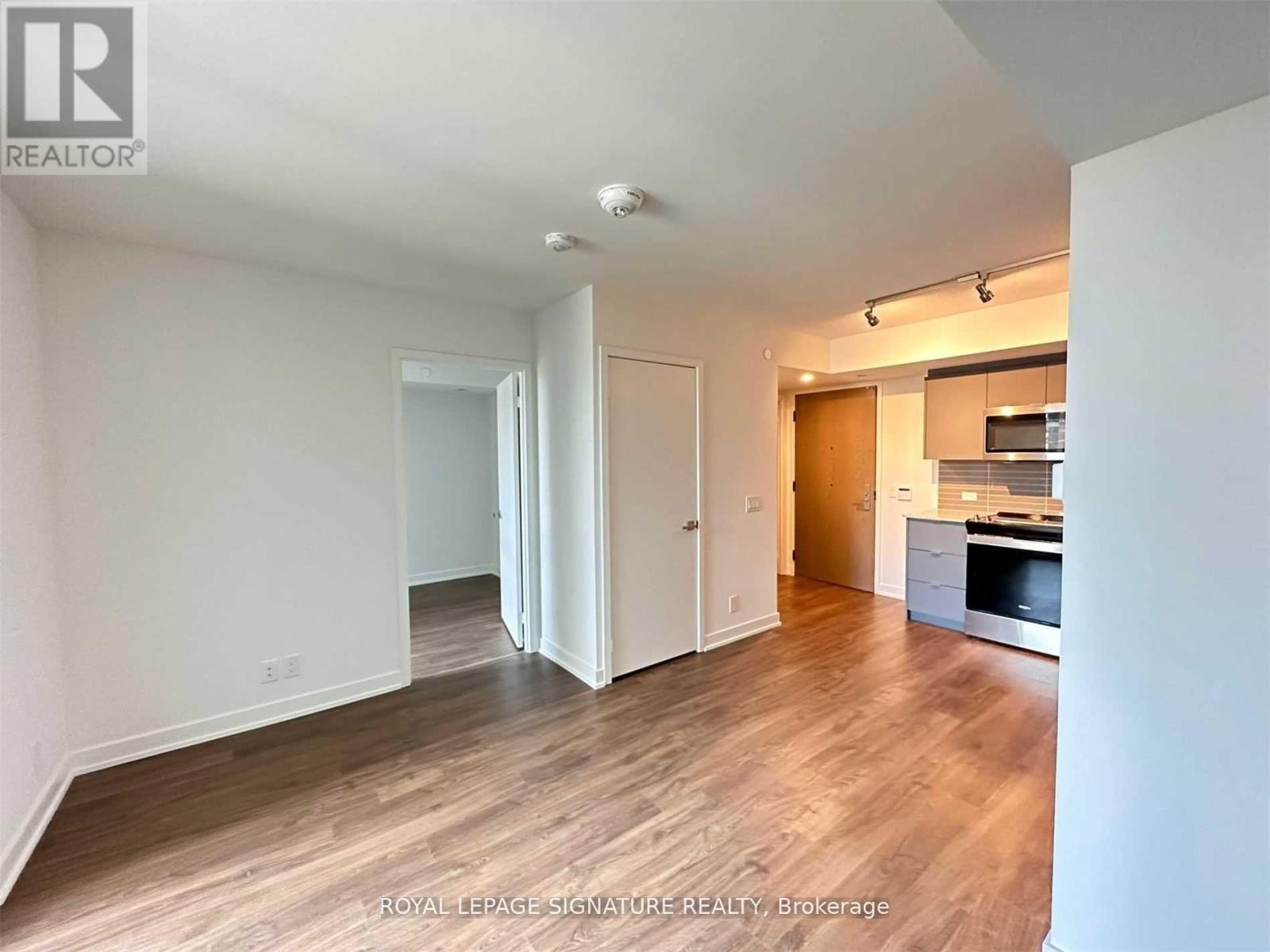 406 - 30 Tretti Way, Toronto, Ontario  M3H 0E3 - Photo 3 - C12497114