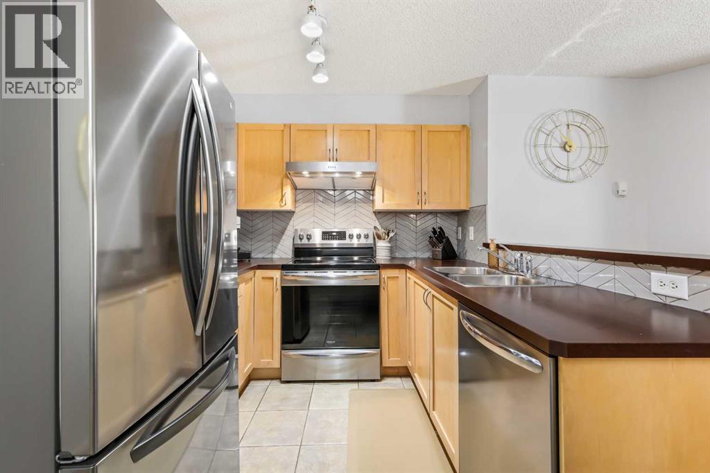 9117, 70 Panamount Drive Nw, Calgary, Alberta  T3K 6K6 - Photo 10 - A2256403