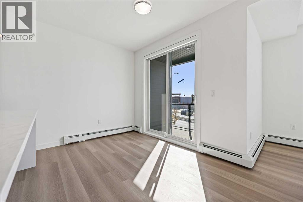 2215, 520 Reynolds Avenue Sw, Airdrie, Alberta  T4B 4K9 - Photo 3 - A2250288