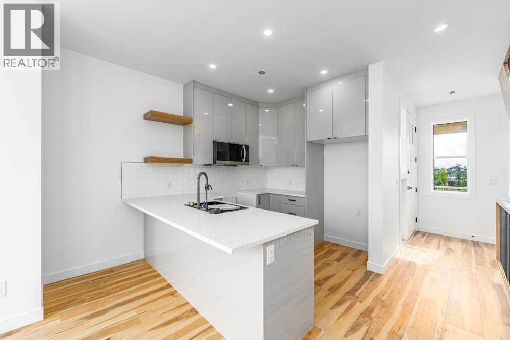 638 Cottageclub Bend, Rural Rocky View County, Alberta  T4C 1B1 - Photo 3 - A2266451