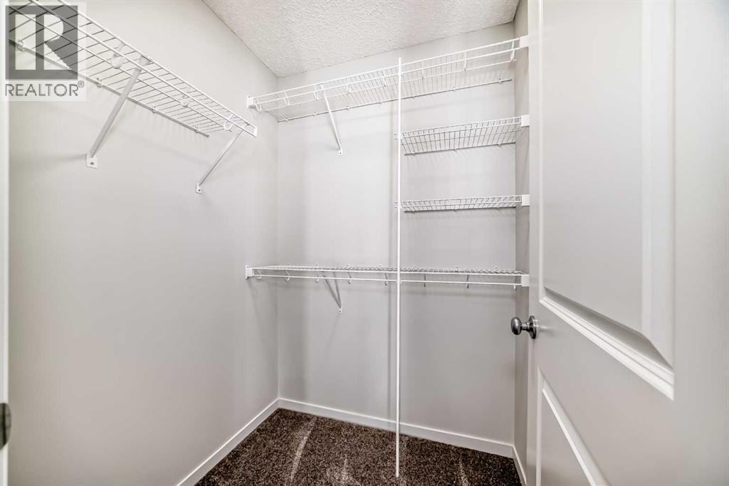 36 Edith Gate Nw, Calgary, Alberta  T3R 1Z2 - Photo 49 - A2261503