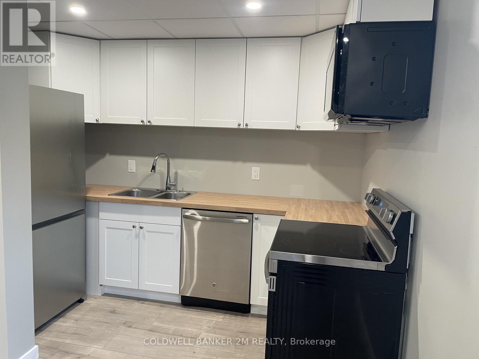 4 - 101 Bobcaygeon Road, Minden Hills (Anson), Ontario  K0M 2K0 - Photo 5 - X12497262