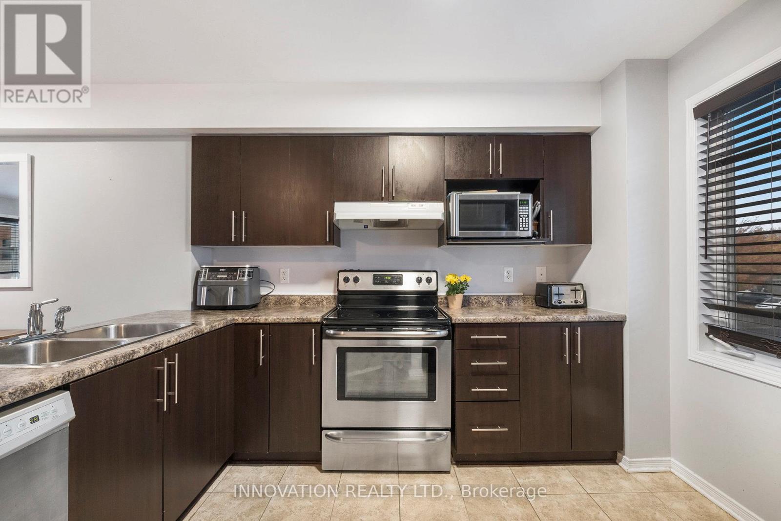 203 Kennevale Drive, Ottawa, Ontario  K2J 0C3 - Photo 7 - X12497608