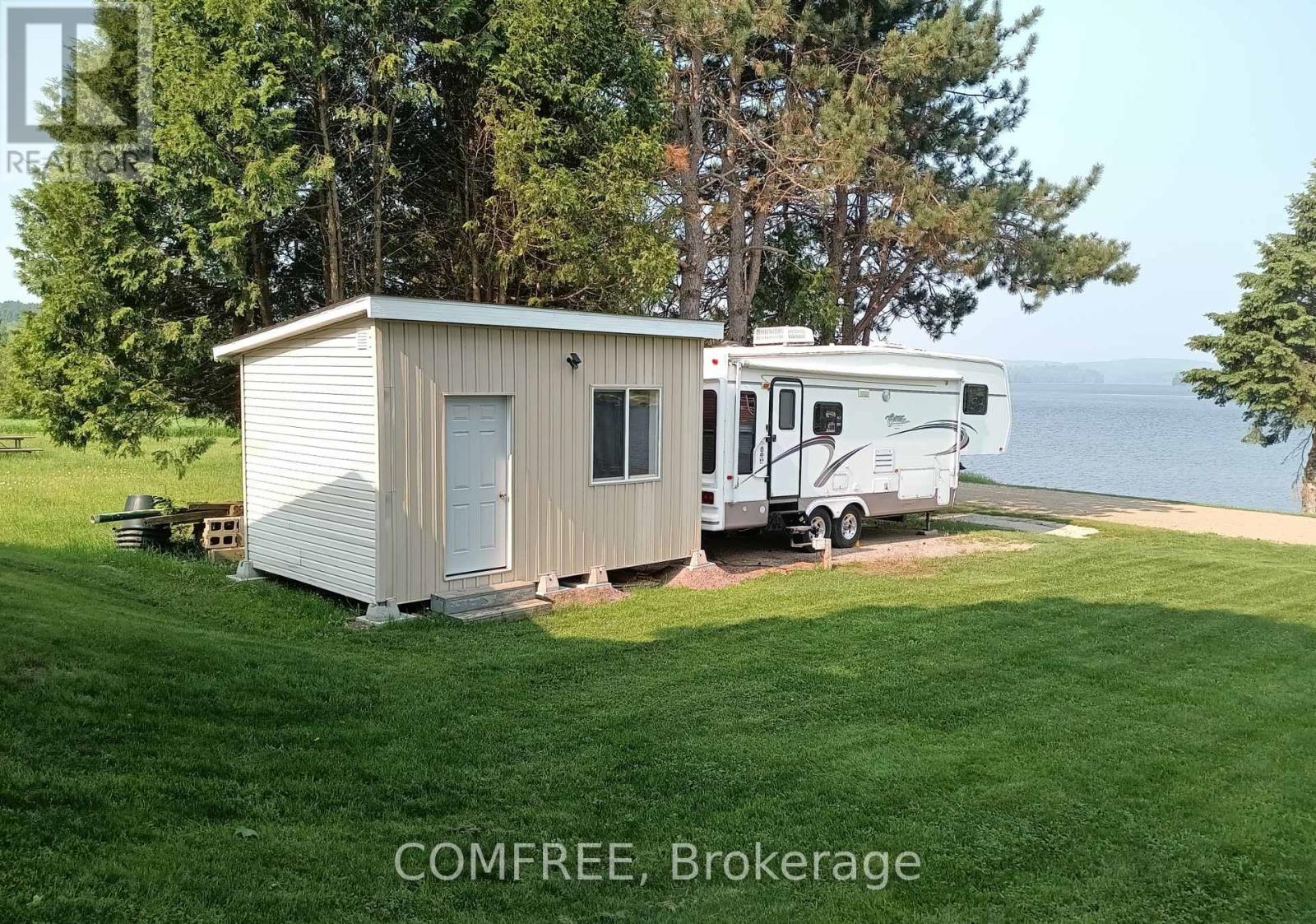 76 Lake Street, South Algonquin, Ontario  K0J 2M0 - Photo 2 - X12497742