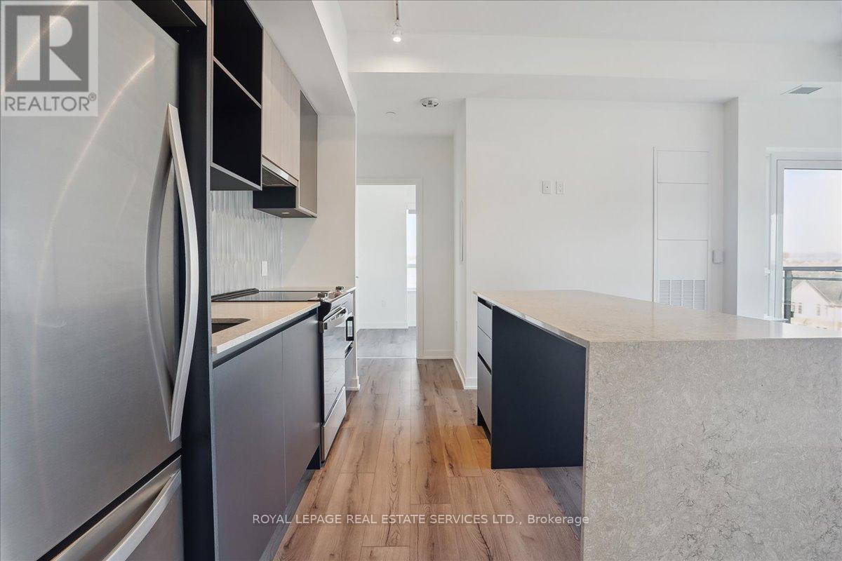 507 - 395 Dundas Street W, Oakville, Ontario  L6M 5R8 - Photo 11 - W12497226