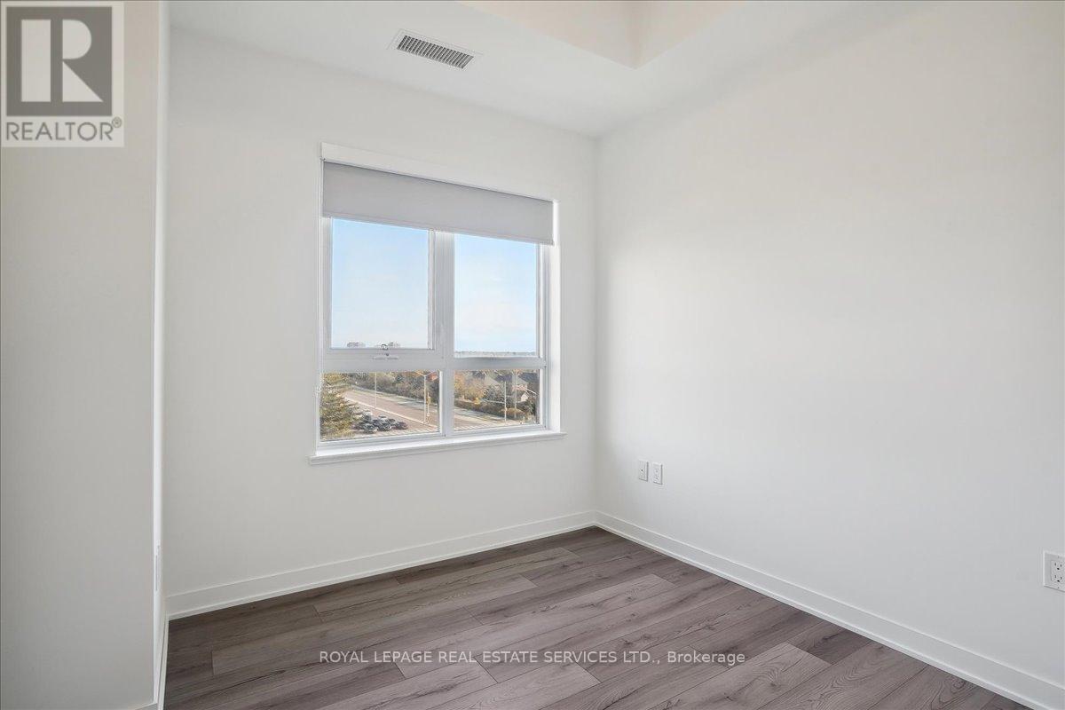 507 - 395 Dundas Street W, Oakville, Ontario  L6M 5R8 - Photo 23 - W12497226