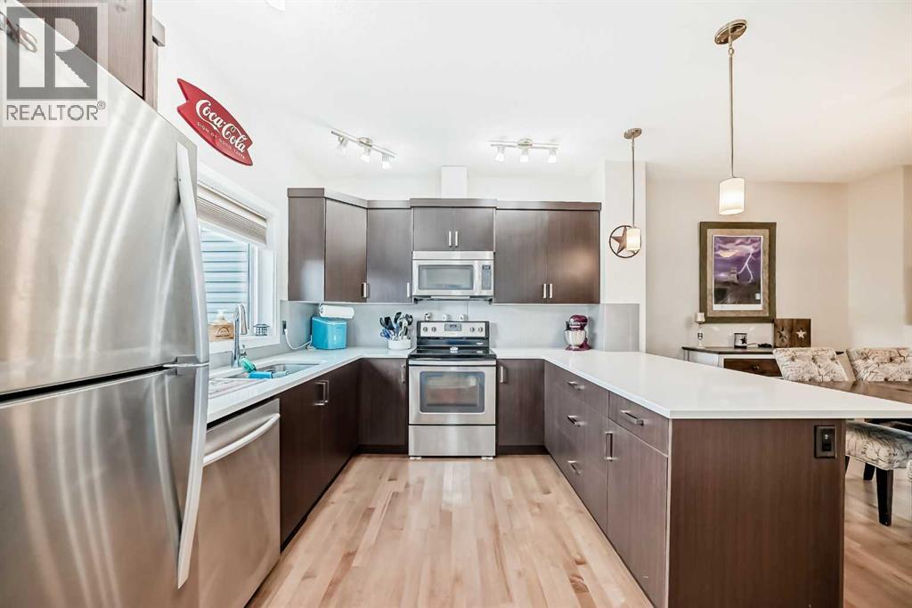 23 Belgian Link, Cochrane, Alberta  T4C 0M3 - Photo 4 - A2247720