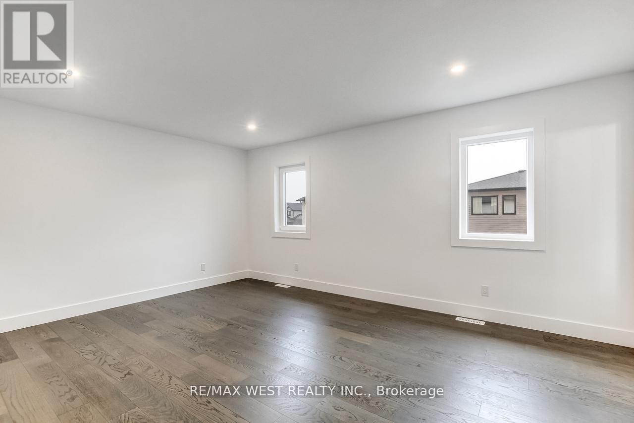 92 Poole Crescent, Middlesex Centre, Ontario  N0L 1R0 - Photo 18 - X12498118