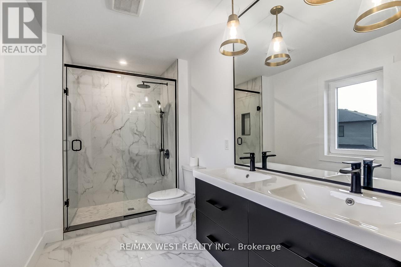 92 Poole Crescent, Middlesex Centre, Ontario  N0L 1R0 - Photo 21 - X12498118