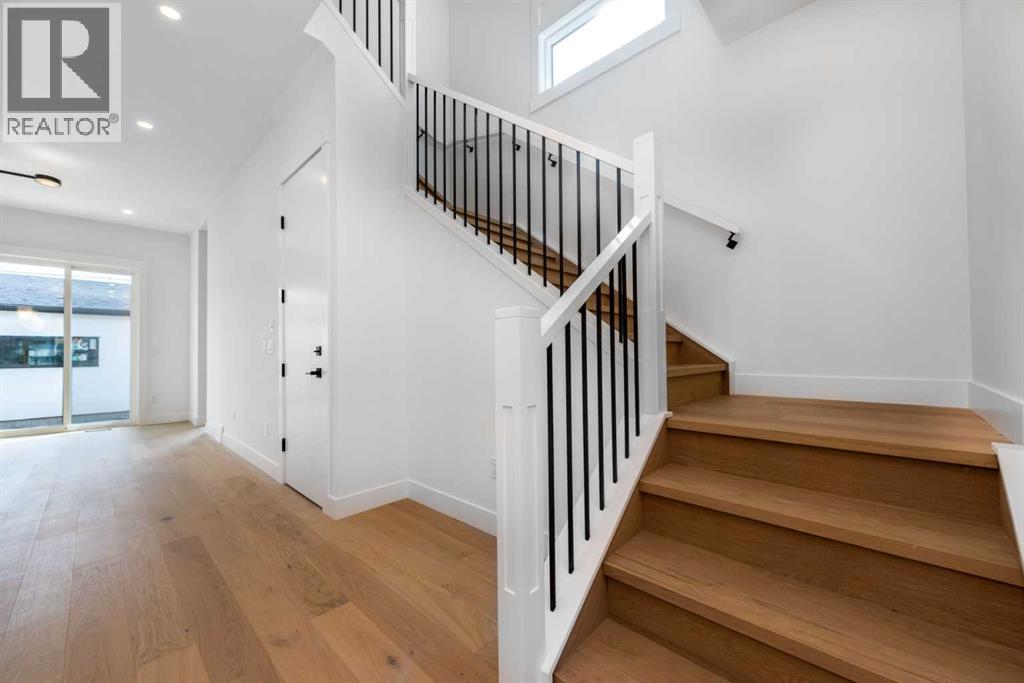 13 Hartford Place Nw, Calgary, Alberta  T2K 2A9 - Photo 2 - A2243575