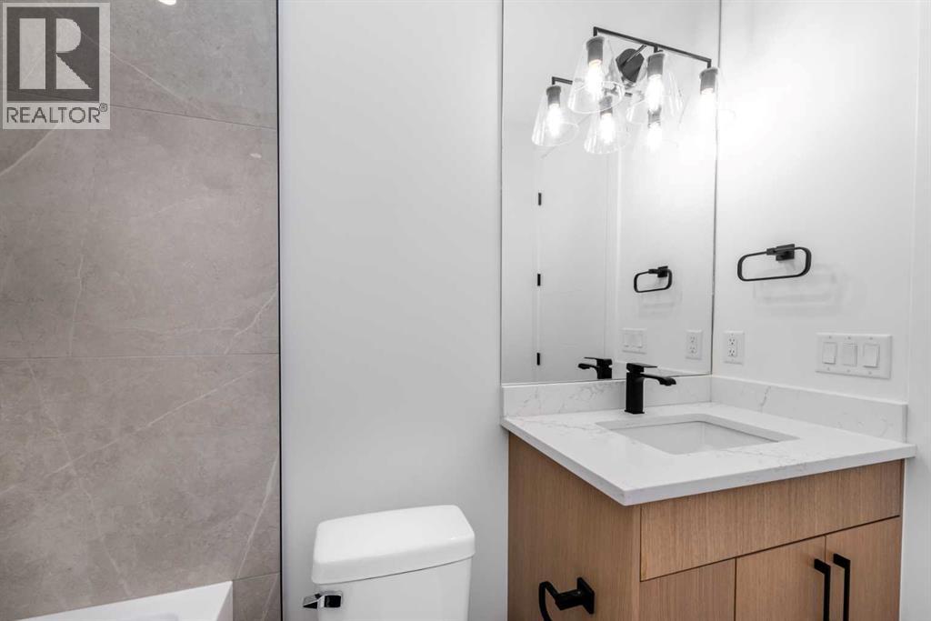 13 Hartford Place Nw, Calgary, Alberta  T2K 2A9 - Photo 14 - A2243575