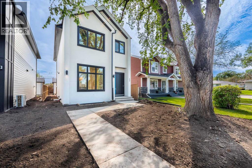 13 Hartford Place Nw, Calgary, Alberta  T2K 2A9 - Photo 5 - A2243575