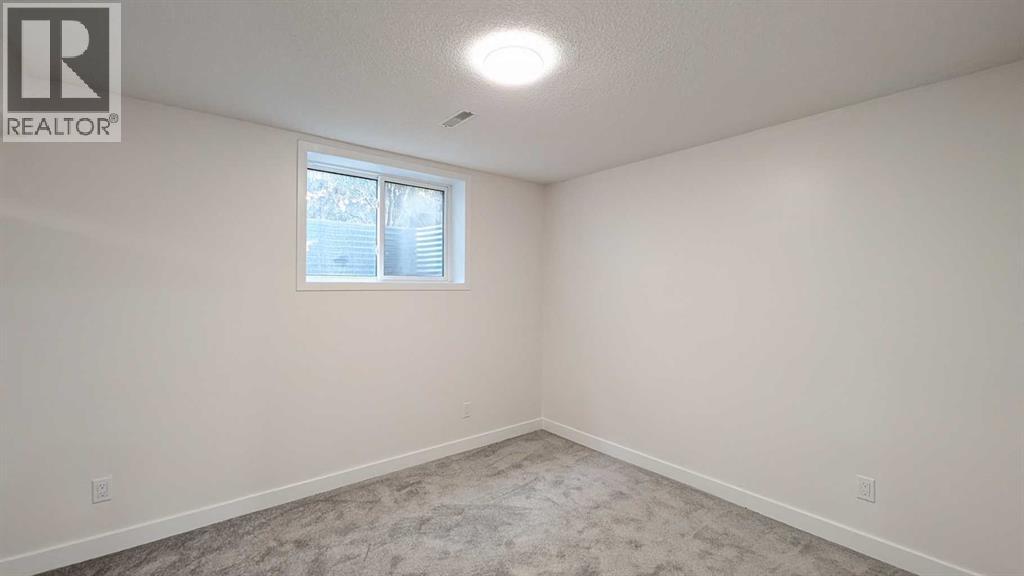 4 Harvey Place Sw, Calgary, Alberta  T2V 3A5 - Photo 22 - A2267449
