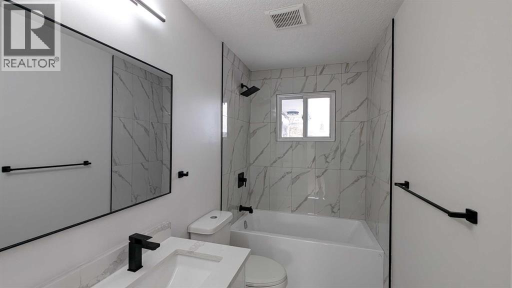 4 Harvey Place Sw, Calgary, Alberta  T2V 3A5 - Photo 17 - A2267449