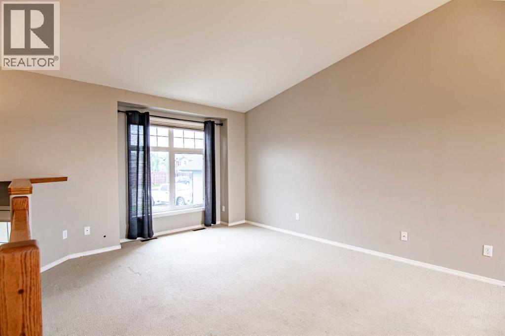 61 Mann Drive, Penhold, Alberta  T0M 1R0 - Photo 17 - A2248337