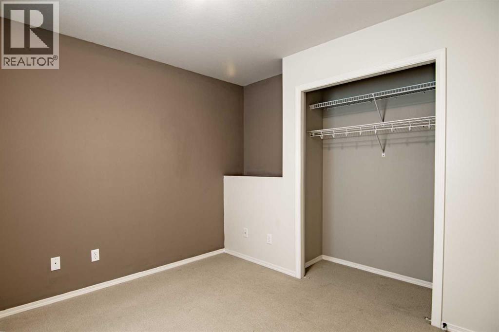 61 Mann Drive, Penhold, Alberta  T0M 1R0 - Photo 27 - A2248337