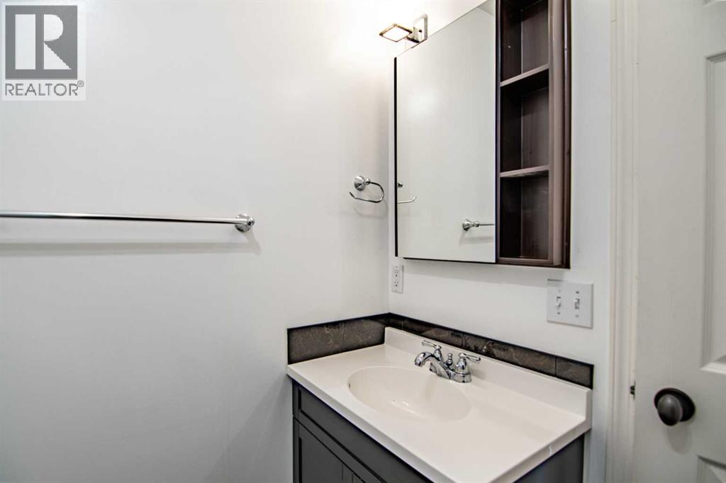 61 Mann Drive, Penhold, Alberta  T0M 1R0 - Photo 34 - A2248337